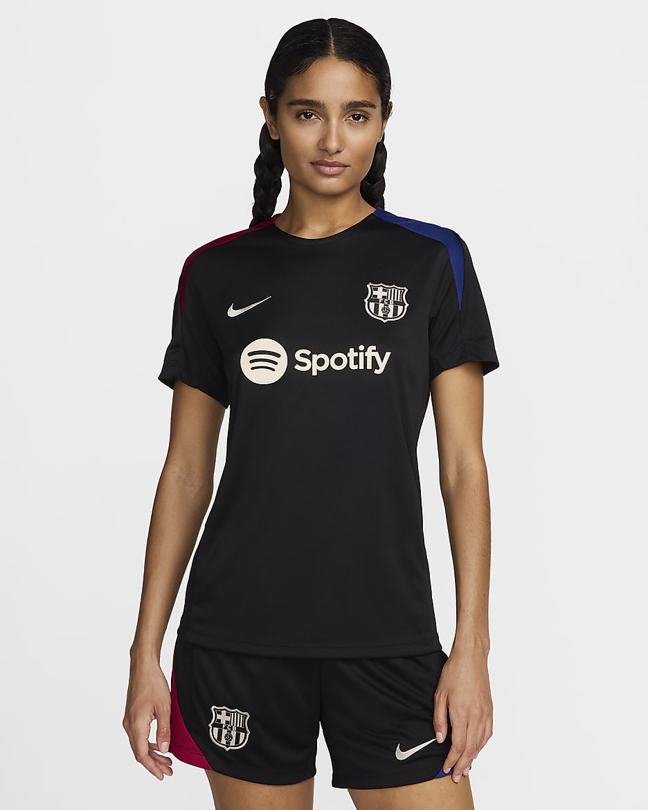 Dámské pleteninové fotbalové tričko Nike Dri-FIT FC Barcelona Strike s krátkým rukávem - Černá/Noble Red/Deep Royal Blue/Light Orewood Brown