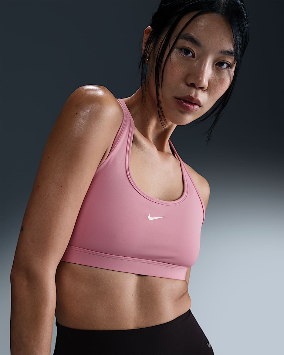 Bra deportivo sin almohadillas para mujer Nike Swoosh Light Support - Rosa elemental/Blanco