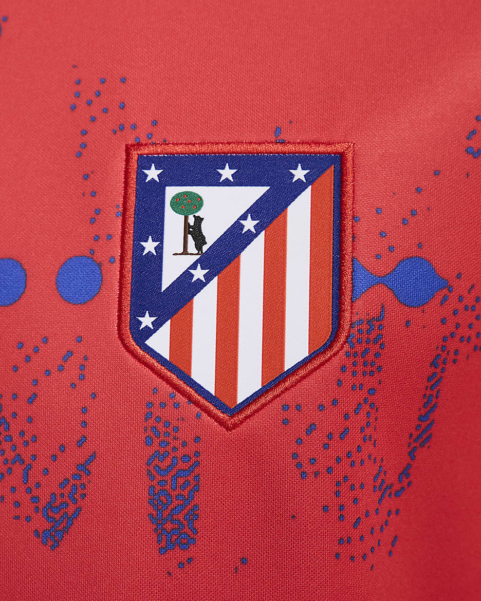 Atlético Madrid Academy Pro Nike Dri-FIT warming-upvoetbaltop met korte mouwen voor heren - Light Crimson/Hyper Royal/Wit