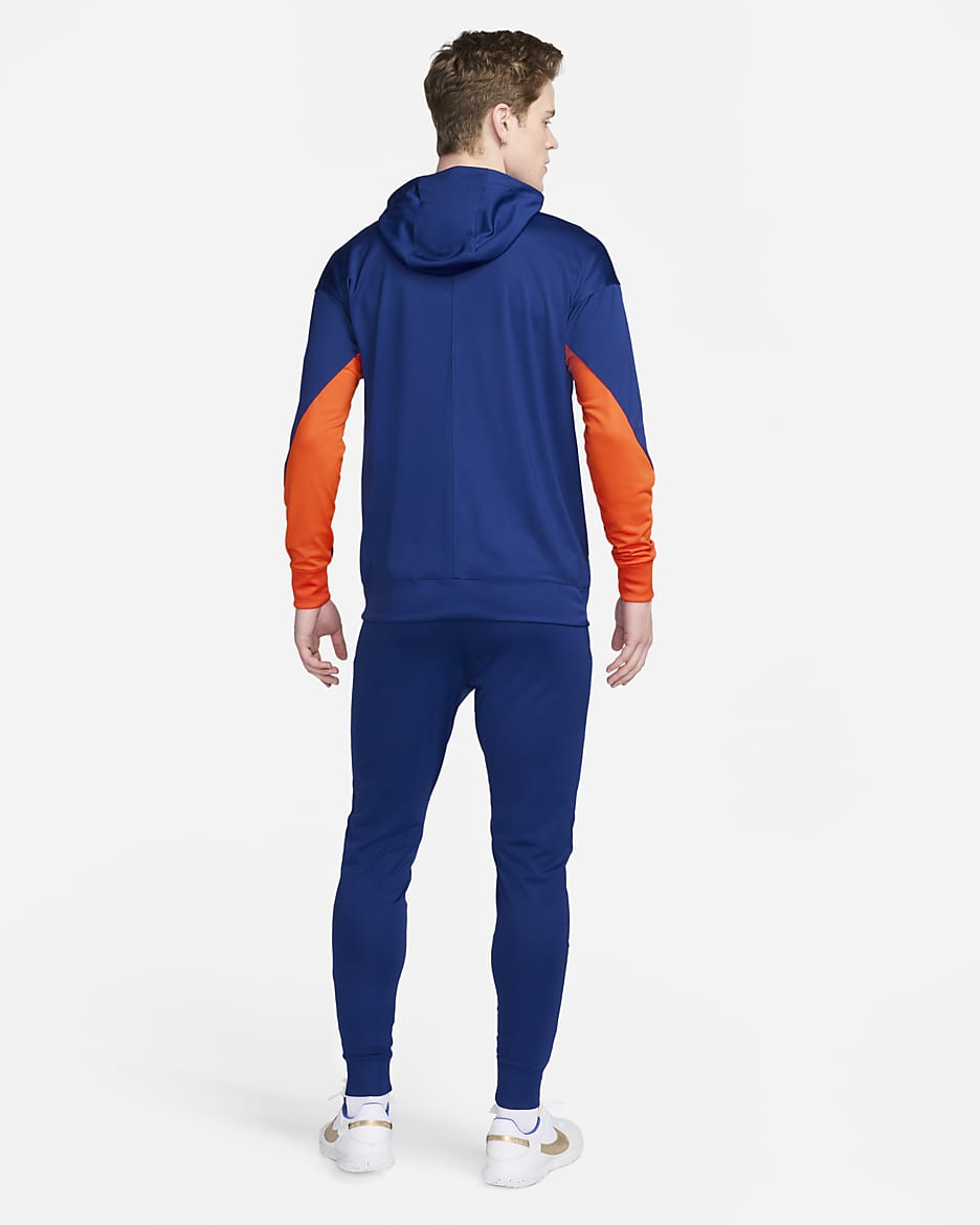 Netherlands Strike Nike Dri-FIT kapucnis, kötött férfi futballtréningruha - Deep Royal Blue/Safety Orange/Safety Orange