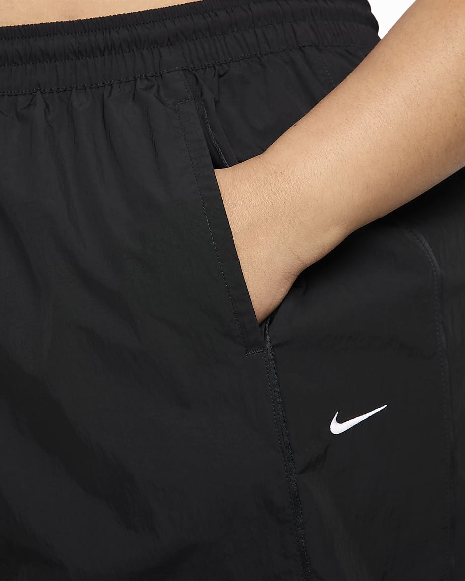 Pants con dobladillo abierto de tejido Woven de tiro alto para mujer Nike Windrunner (talla grande) - Negro/Blanco