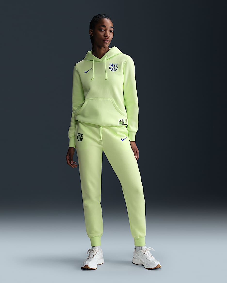 Pants de fútbol Nike de cintura alta del FC Barcelona alternativos Phoenix Fleece para mujer - Lima líquida claro/Azul eléctrico