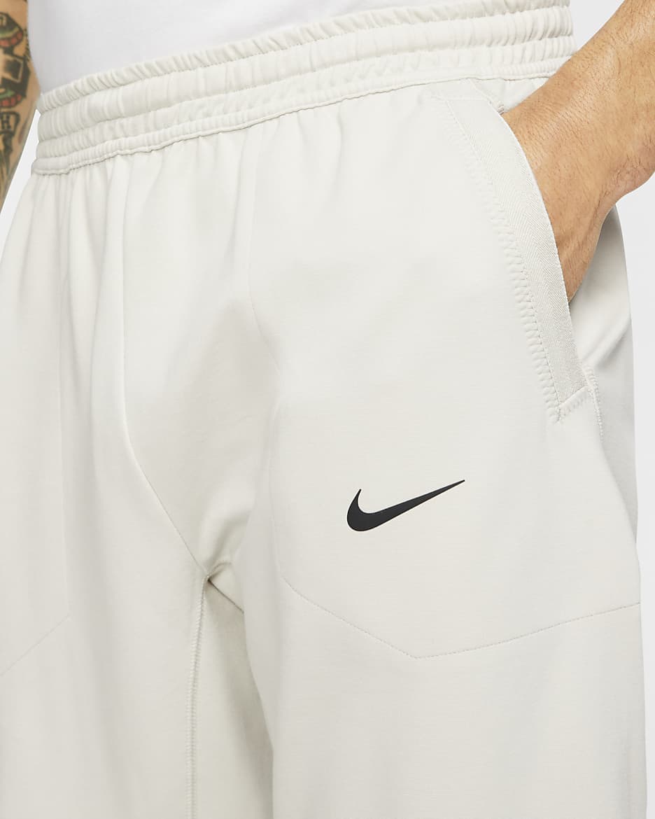 Nike Sportswear Tech Pack Strickhose für Herren - Light Bone/Schwarz