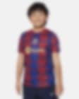 Low Resolution FC Barcelona Academy Pro Nike Dri-FIT Pre-Match-fodboldtrøje til større børn