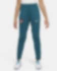 Low Resolution Dzianinowe spodnie piłkarskie dla dużych dzieci Nike Dri-FIT Portugalia Strike