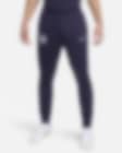 Low Resolution Pánské pleteninové fotbalové kalhoty Nike Dri-FIT Anglie Strike