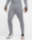 Low Resolution Męskie spodnie piłkarskie z dzianiny Nike Dri-FIT Nigeria Strike