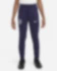 Low Resolution Dzianinowe spodnie piłkarskie dla dużych dzieci Nike Dri-FIT Anglia Strike