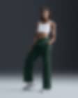 Low Resolution Pantaloni in tessuto a vita alta con bordo aperto Nike Windrunner – Donna