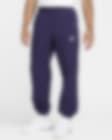 Low Resolution Pantaloni in tessuto per l'inverno Nike Windrunner – Uomo