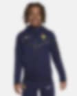 Low Resolution Ποδοσφαιρική μπλούζα με κουκούλα και φερμουάρ σε όλο το μήκος Nike Γαλλία Tech Fleece για μεγάλα αγόρια