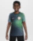 Low Resolution Předzápasové fotbalové tričko Nike Dri-FIT Nigeria Academy Pro pro větší děti s krátkým rukávem
