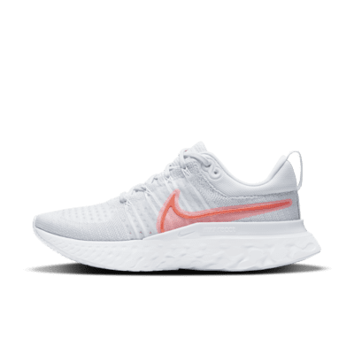 nike running free run flyknit trainers in grey and pink