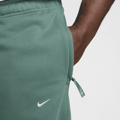 Pants de tejido Fleece con dobladillo abierto para hombre Nike Solo Swoosh