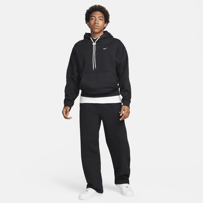 Pantalon en tissu Fleece à ourlet ouvert Nike Solo Swoosh pour homme