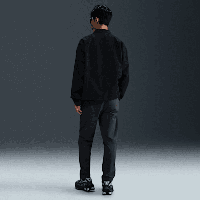 Pantaloni in tessuto Nike Tech – Uomo