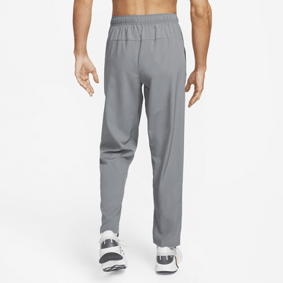 Pants Dri-FIT versátiles con dobladillo abierto para hombre Nike Form