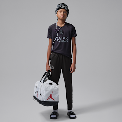 Paris Saint-Germain Strike Fourth Jordan Dri-FIT-Fußballhose aus Strickmaterial (ältere Kinder)