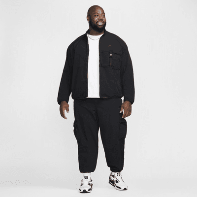 Pantaloni cargo in tessuto Nike Tech – Uomo