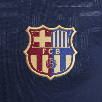 Maglia da calcio pre-partita a manica corta Nike Dri-FIT FC Barcelona Academy Pro per ragazzo/a – Home