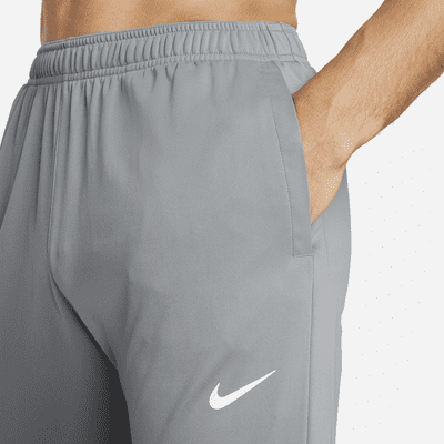 Nike Dri-FIT Challenger Pantalons de teixit Knit de running - Home