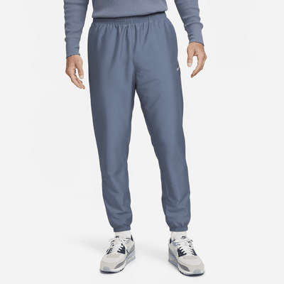 Nike Sportswear Men's Woven Trousers. Nike UK