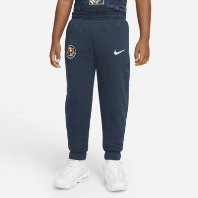 Clip mariposa espía patrocinado Pantalones de fútbol de tejido Fleece para niños talla grande Club América.  Nike.com