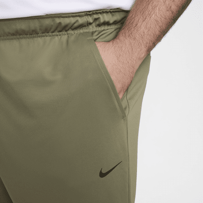 Pants Dri-FIT versátiles con dobladillo abierto para hombre Nike Totality