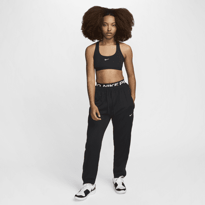 Pantalon de basket à boutons-pression Nike Dri-FIT pour femme