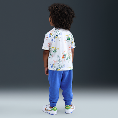 Conjunto de playera y pants Reveal estampado infantil Nike Sportswear