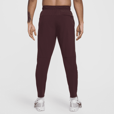 Pants versátiles Dri-FIT de pierna entallada para hombre Nike Unlimited