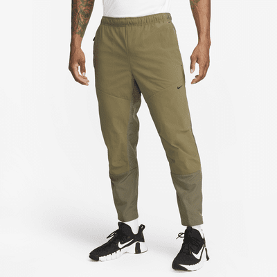 Nike A.P.S. Pants versátiles de tejido Woven Dri-FIT ADV para hombre