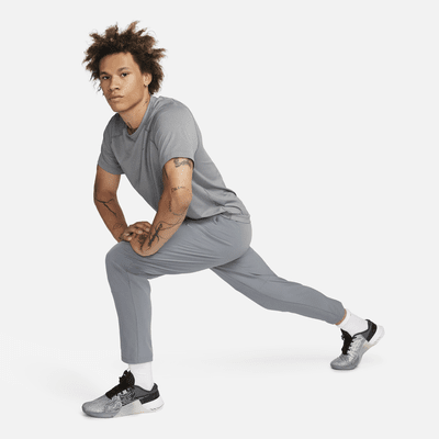 Nike Unlimited Men's Dri-FIT Tapered Leg Versatile Pants. Nike.com