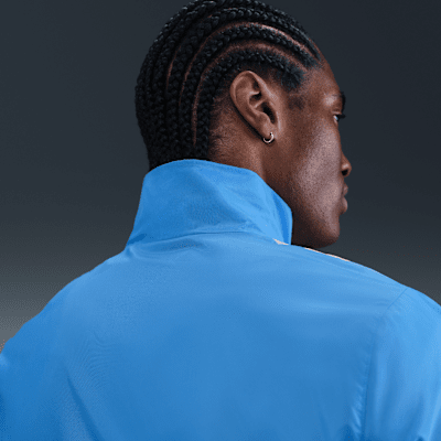Tuta in tessuto Nike Club – Uomo