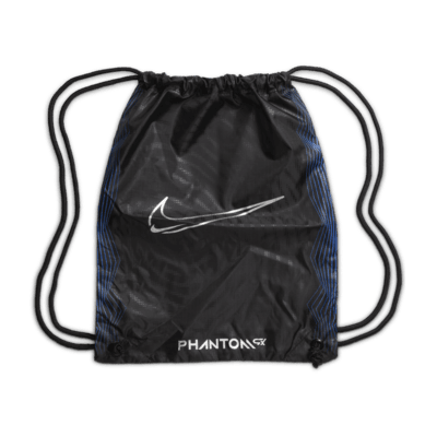 Tacos de fútbol de corte low para terreno firme Nike Phantom GX Elite