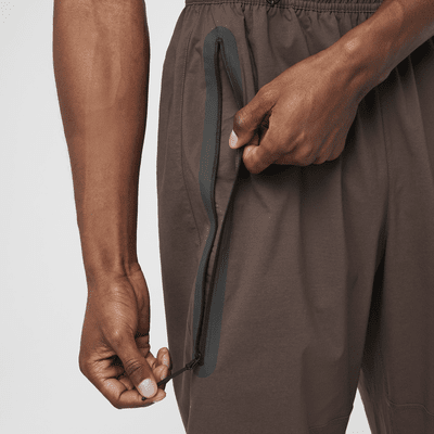 Calças folgadas entrançadas Nike Tech para homem