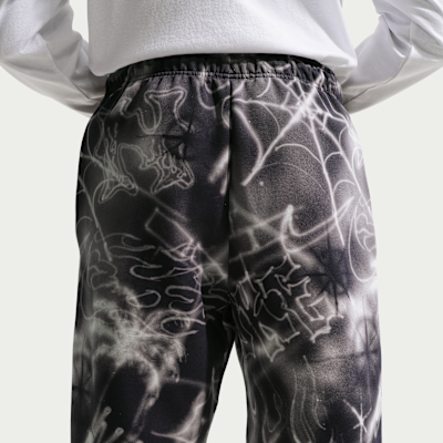 Pantalon de basket à ourlet ouvert brossé Nike Standard Issue pour homme