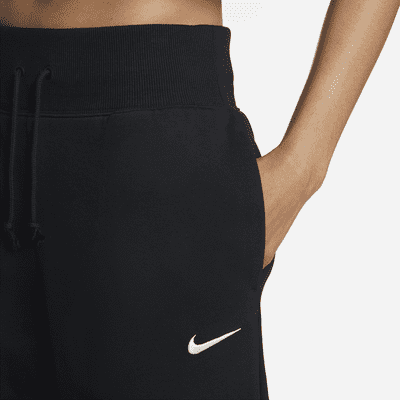 Pantaloni tuta Curve a 7/8 e vita alta Nike Sportswear Phoenix Fleece – Donna