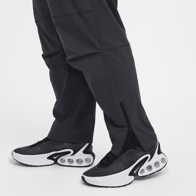 Pantaloni in tessuto Nike Tech – Uomo