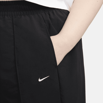 Pants de tiro medio con dobladillo abierto para mujer (talla grande) Nike Sportswear Everything Wovens