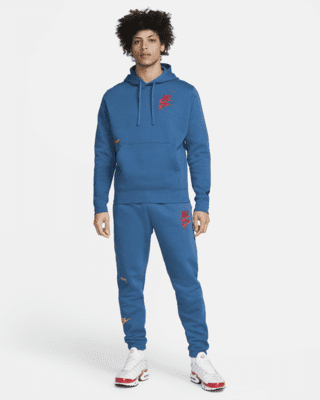 nike essential fleece multi logo tracksuit in white