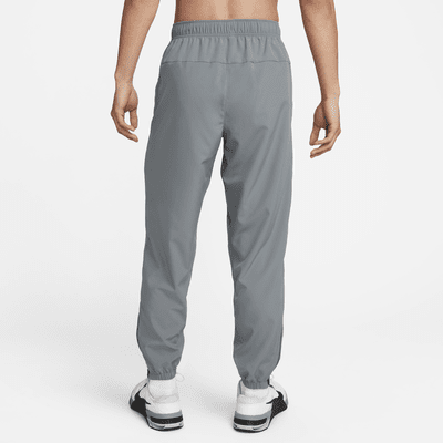 Pants Dri-FIT entallados versátiles para hombre Nike Form