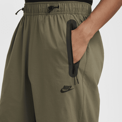 กางเกงขายาวทรงเปิดชายแบบทอผู้ชาย Nike Tech