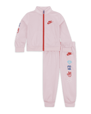 Light pink nike on sale tracksuit