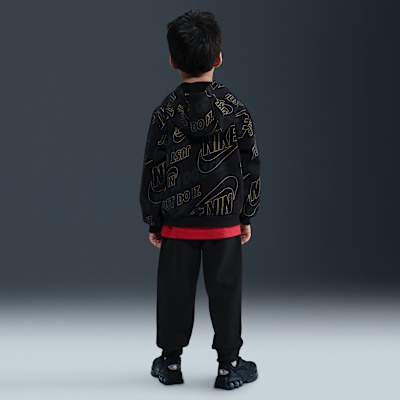 Todelt Nike Glow With Me-sæt i letvægtsfleece til mindre børn