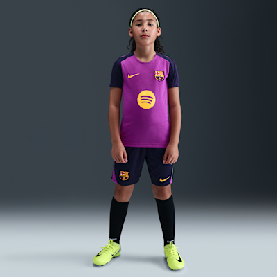 Koszulka piłkarska z krótkim rękawem dla dużych dzieci Nike Dri-FIT FC Barcelona Strike