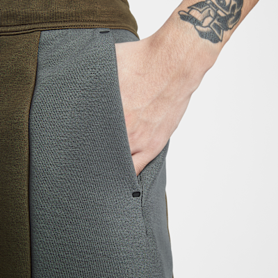 나이키 테크 남성 컬러 블록 오픈 헴 플리스 팬츠