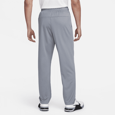 Pants Dri-FIT versátiles con dobladillo abierto para hombre Nike Totality