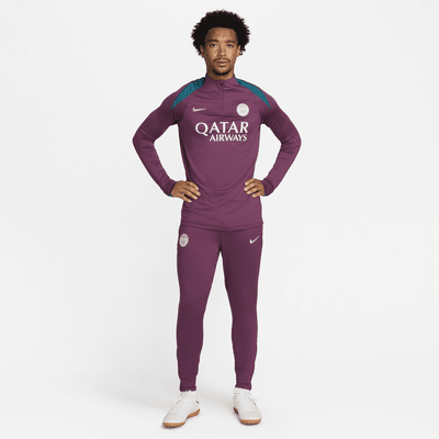 Męskie spodnie piłkarskie z dzianiny Nike Dri-FIT Paris Saint-Germain Strike