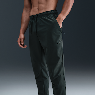 Pants versátiles Dri-FIT de pierna entallada para hombre Nike Unlimited